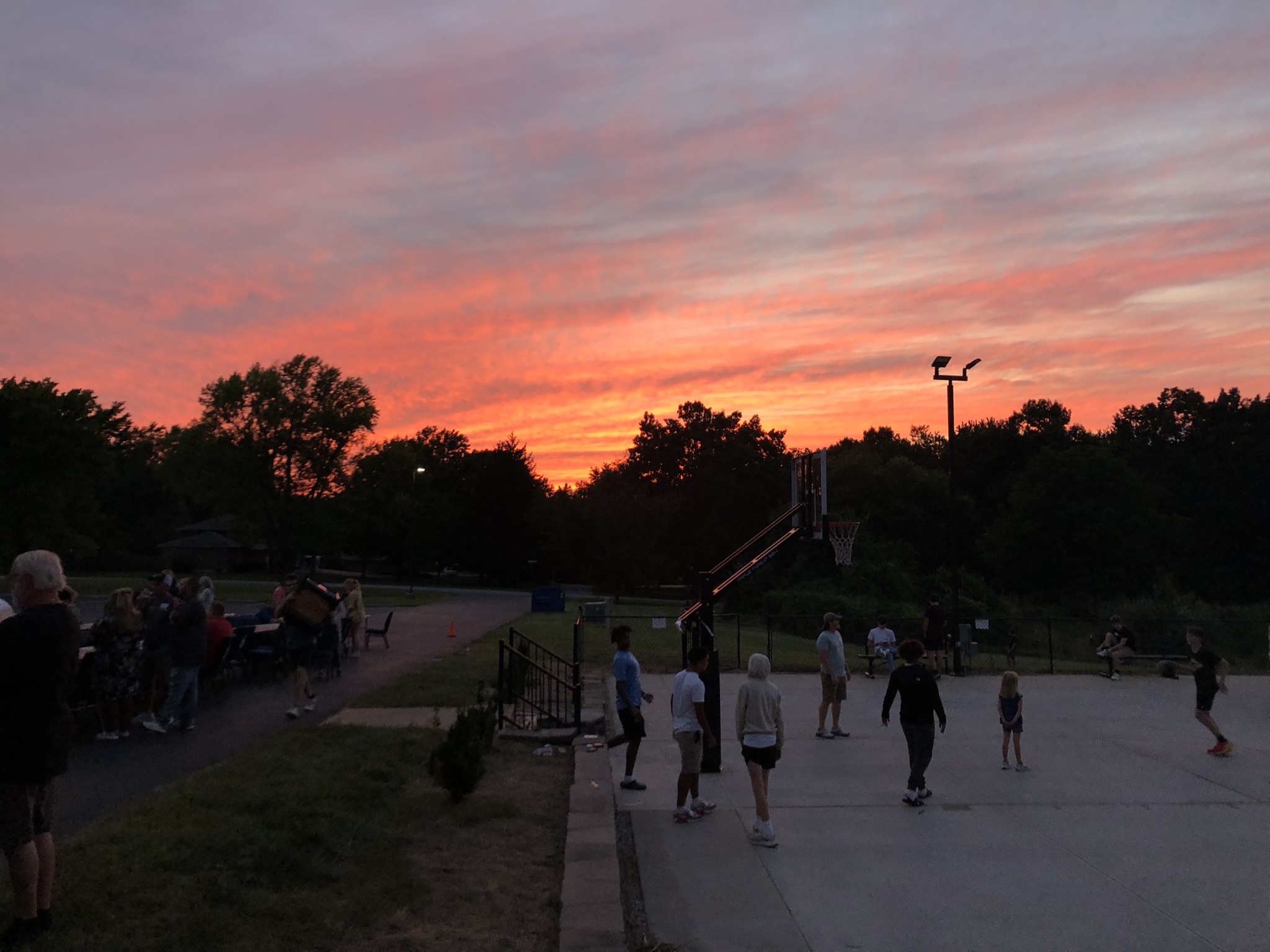 River Bluff community gathering at sunset
